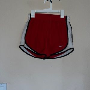 Red Nike shorts